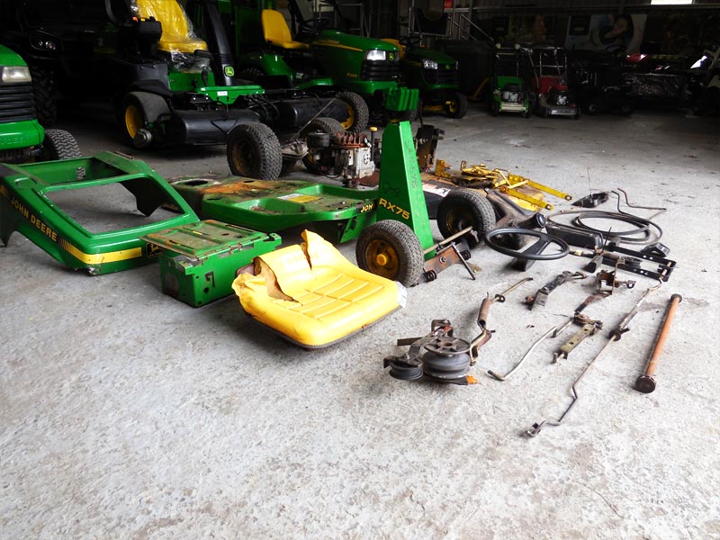 Lawnmower being repaired