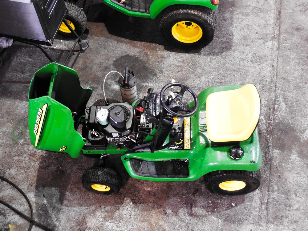 John Deere lawnmower being serviced.